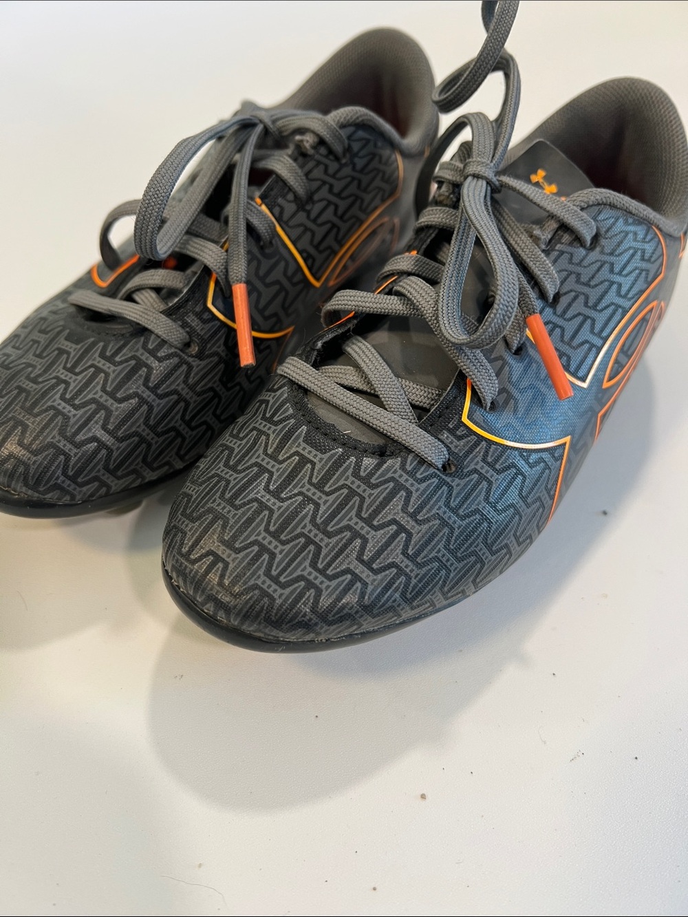 Under Armour Kids Gray Soccer Cleats - gray and orange